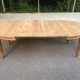 Renovated round extendable Art Deco dining table in raw wood, 1950, 225cm.