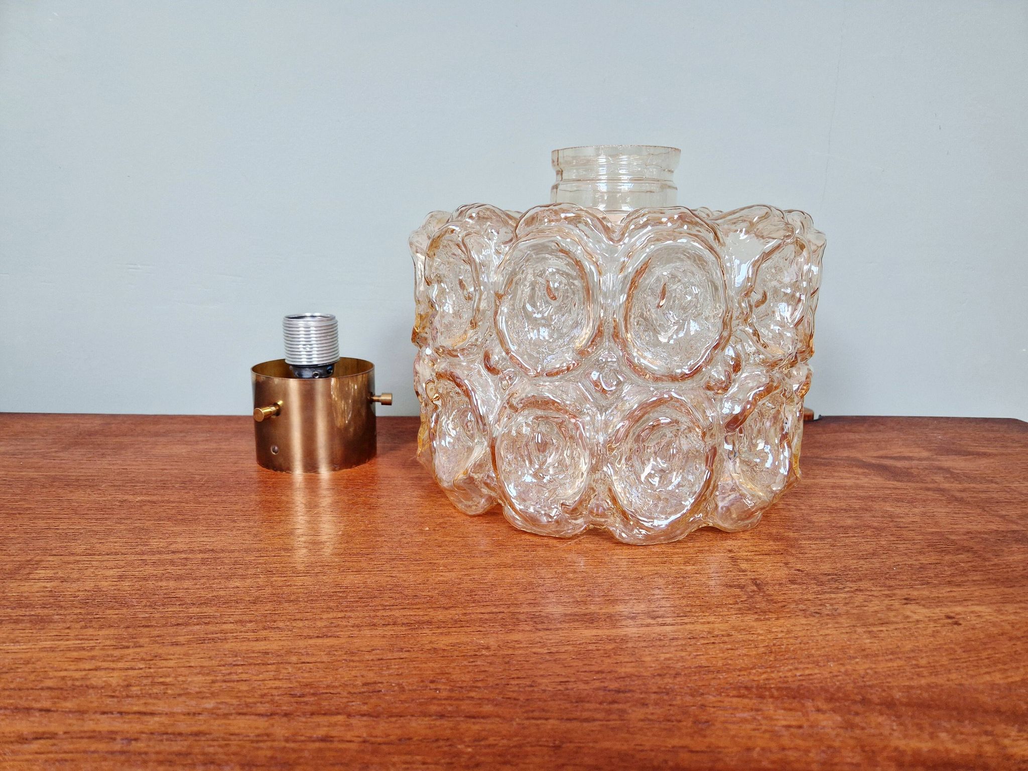 Brass and amber textured glass ceiling light, design by Helena Tynell, Limburg.