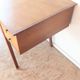 1950s oak double-sided desk with compass legs.