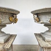 Large pair of 19th-century cast iron basins with vine decoration.