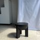 Black mango wood tripod side table with a semi-spherical top, height: 45 cm, diameter: 44 cm.