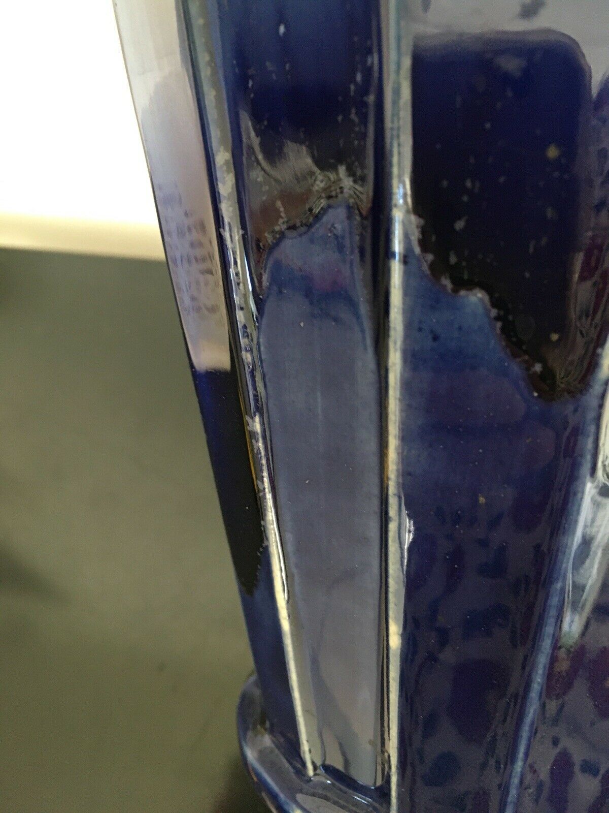 Old blue enamelled ceramic vase