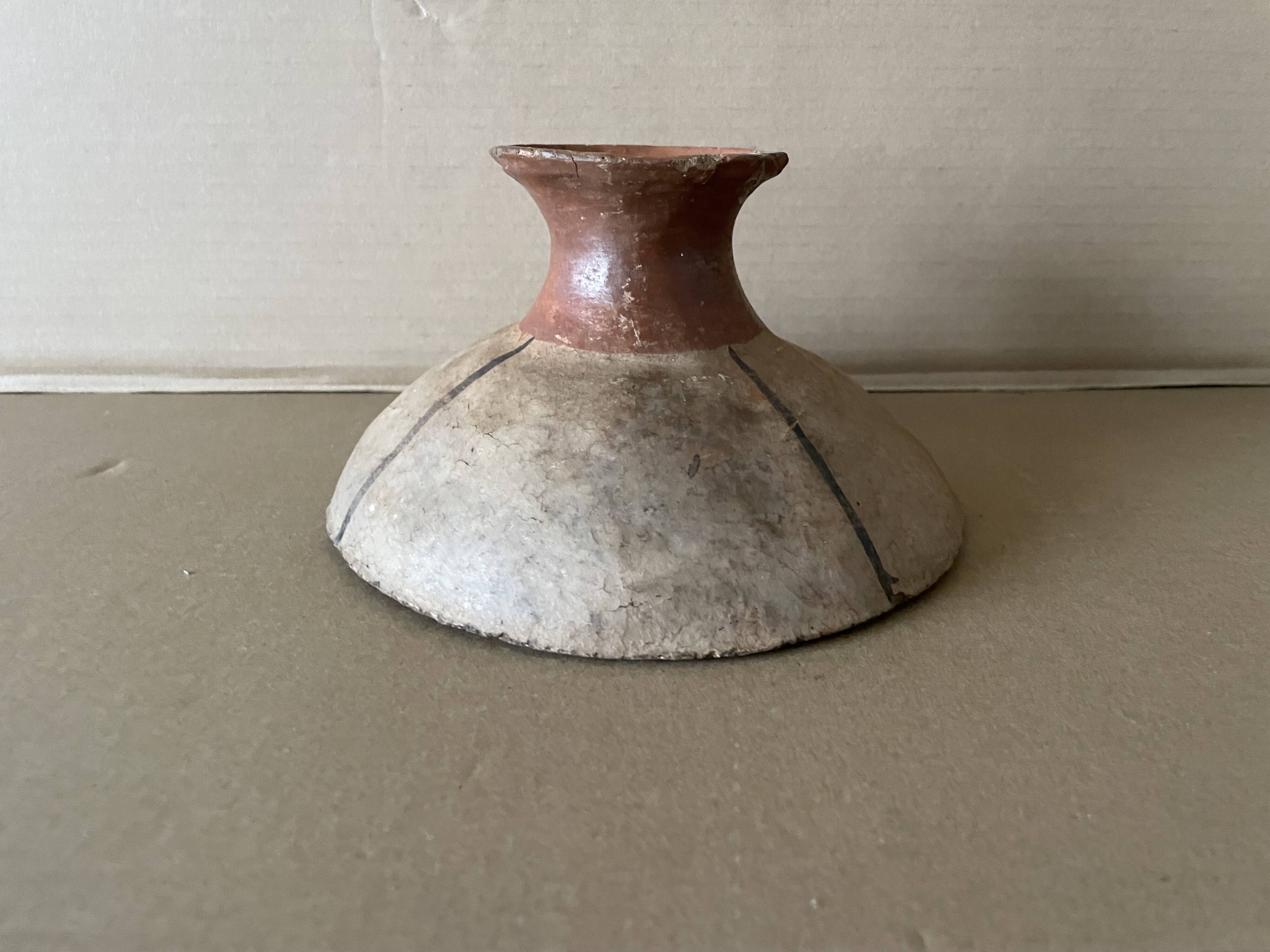 Antique terracotta cup