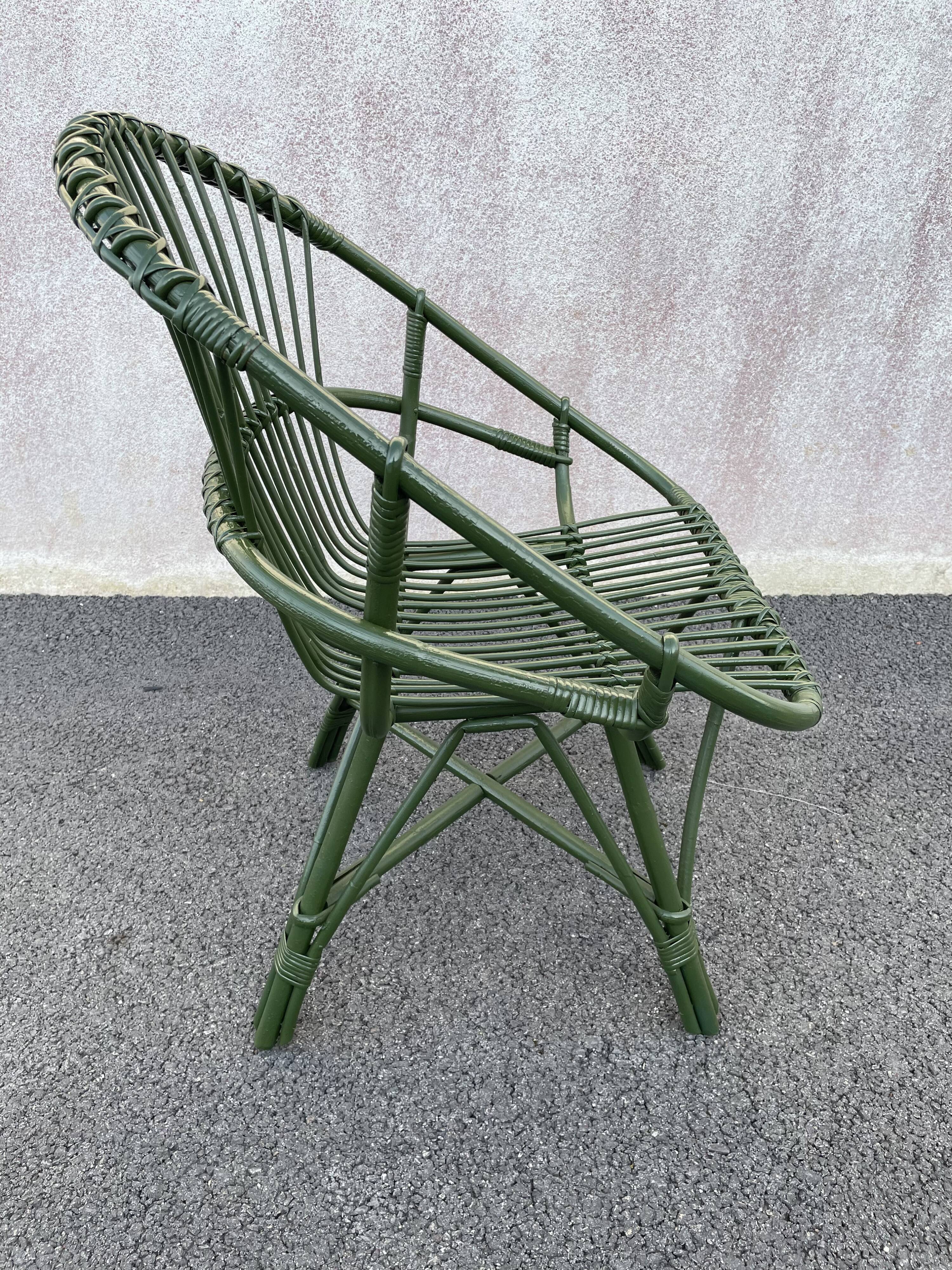 Green rattan armchair
