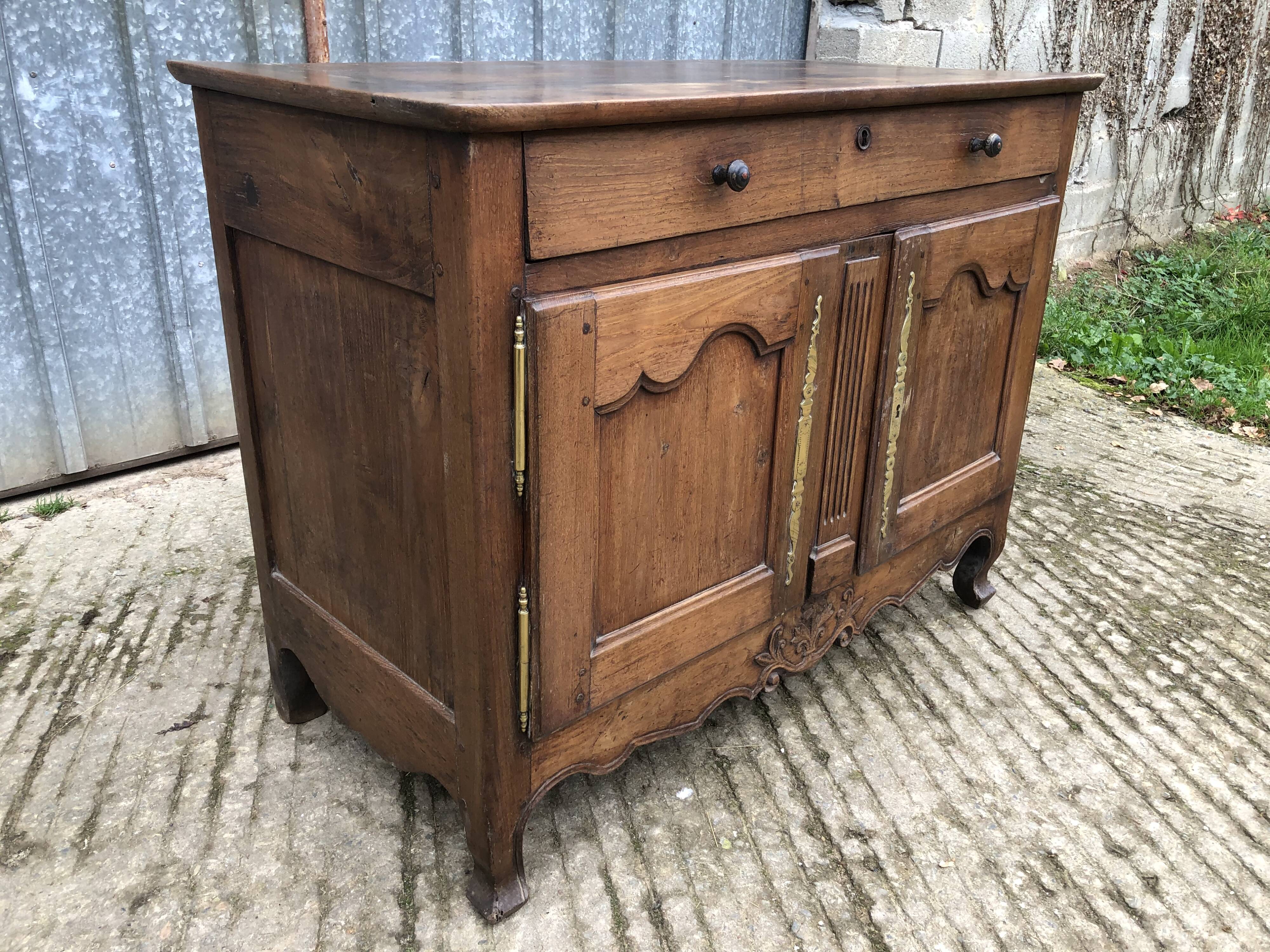 Antique Louis XV low chestnut sideboard with 2 doors and 1 drawer.