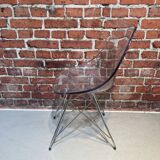 Suite of four plexiglass and metal chairs