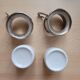 2 porcelain coffee cups with cup holder and metal tray
