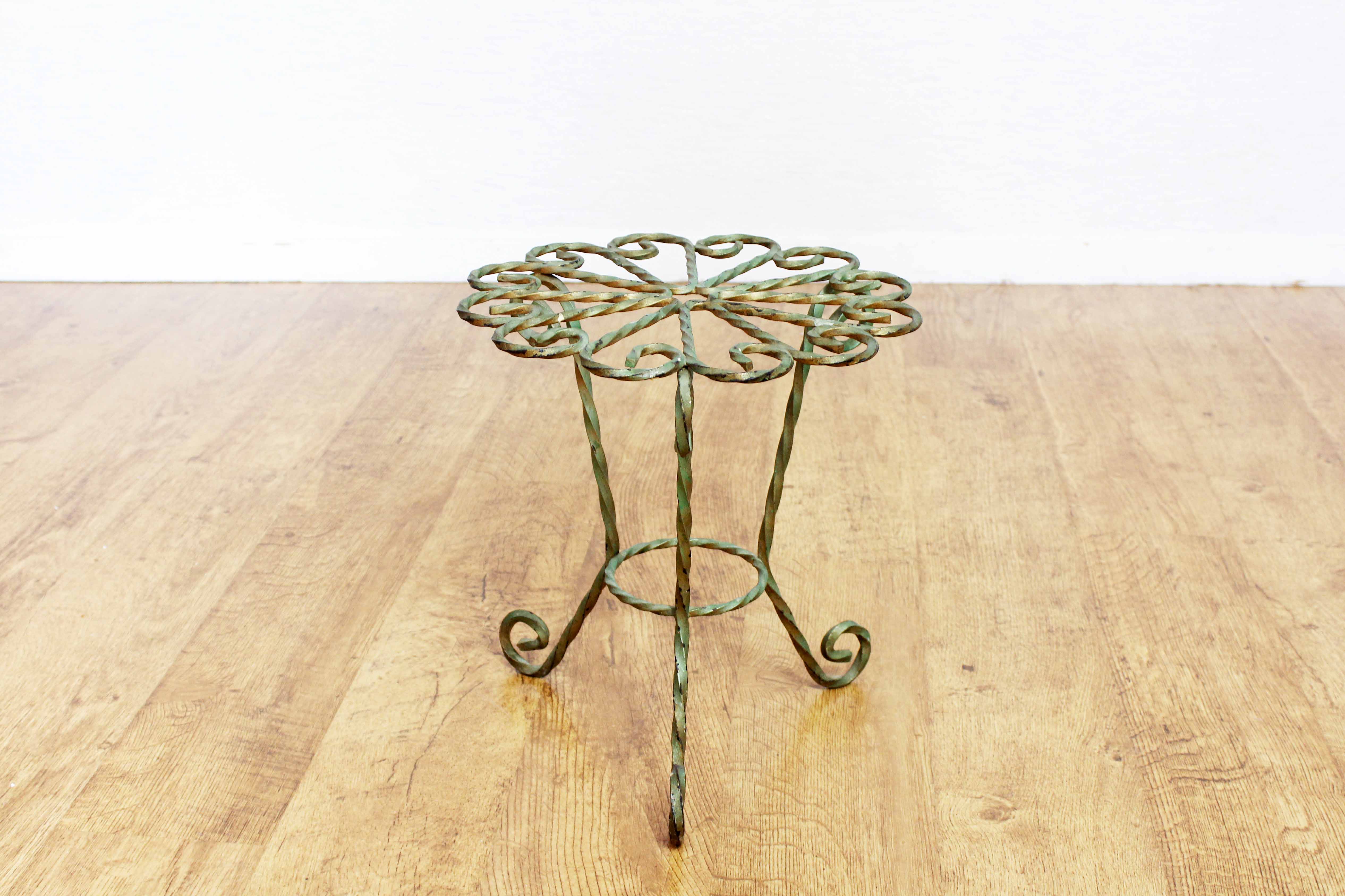 Wrought iron plant holder