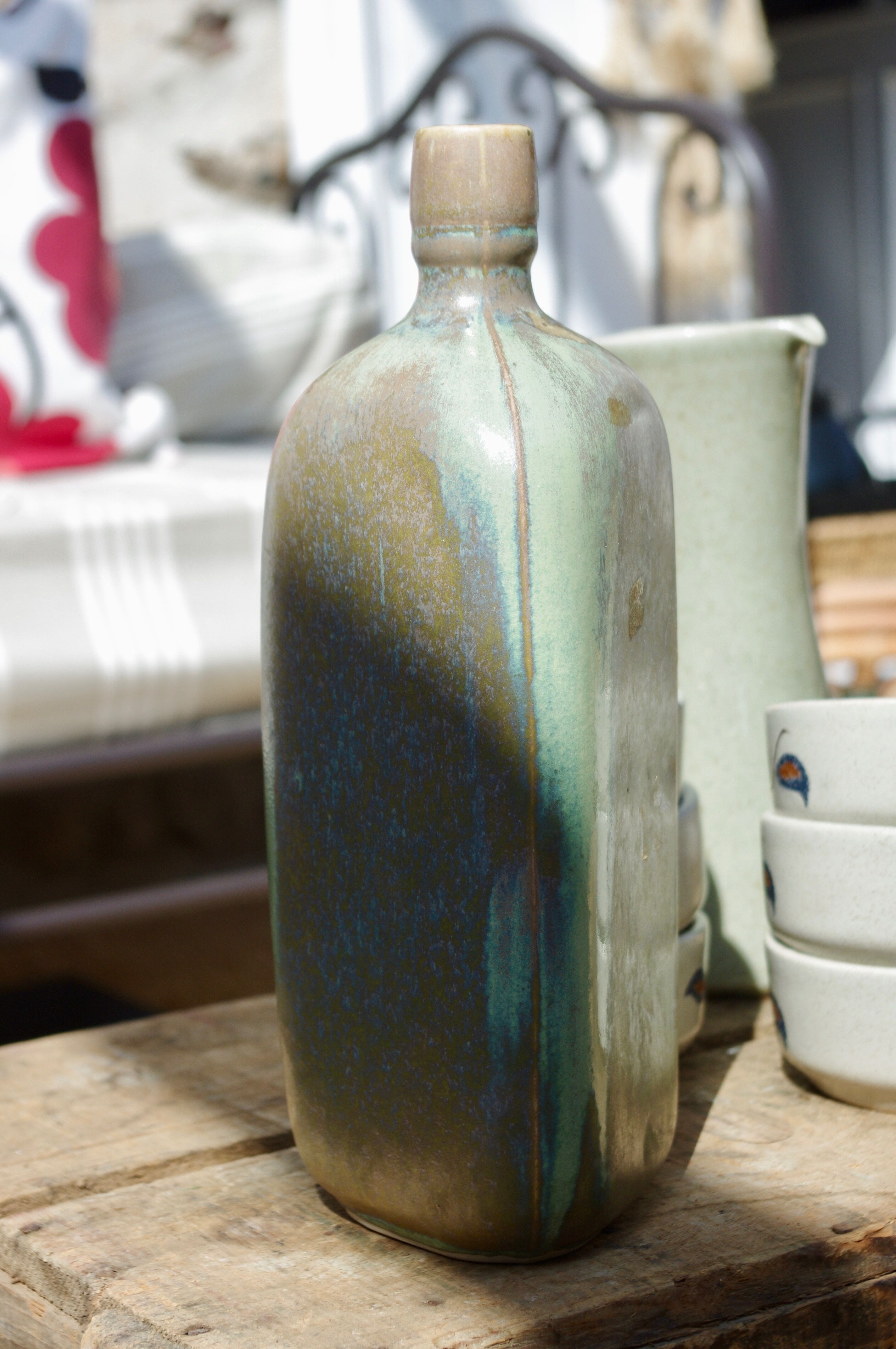 sandstone triangular bottle