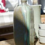 sandstone triangular bottle