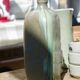 Bouteille en grès flammé triangulaire