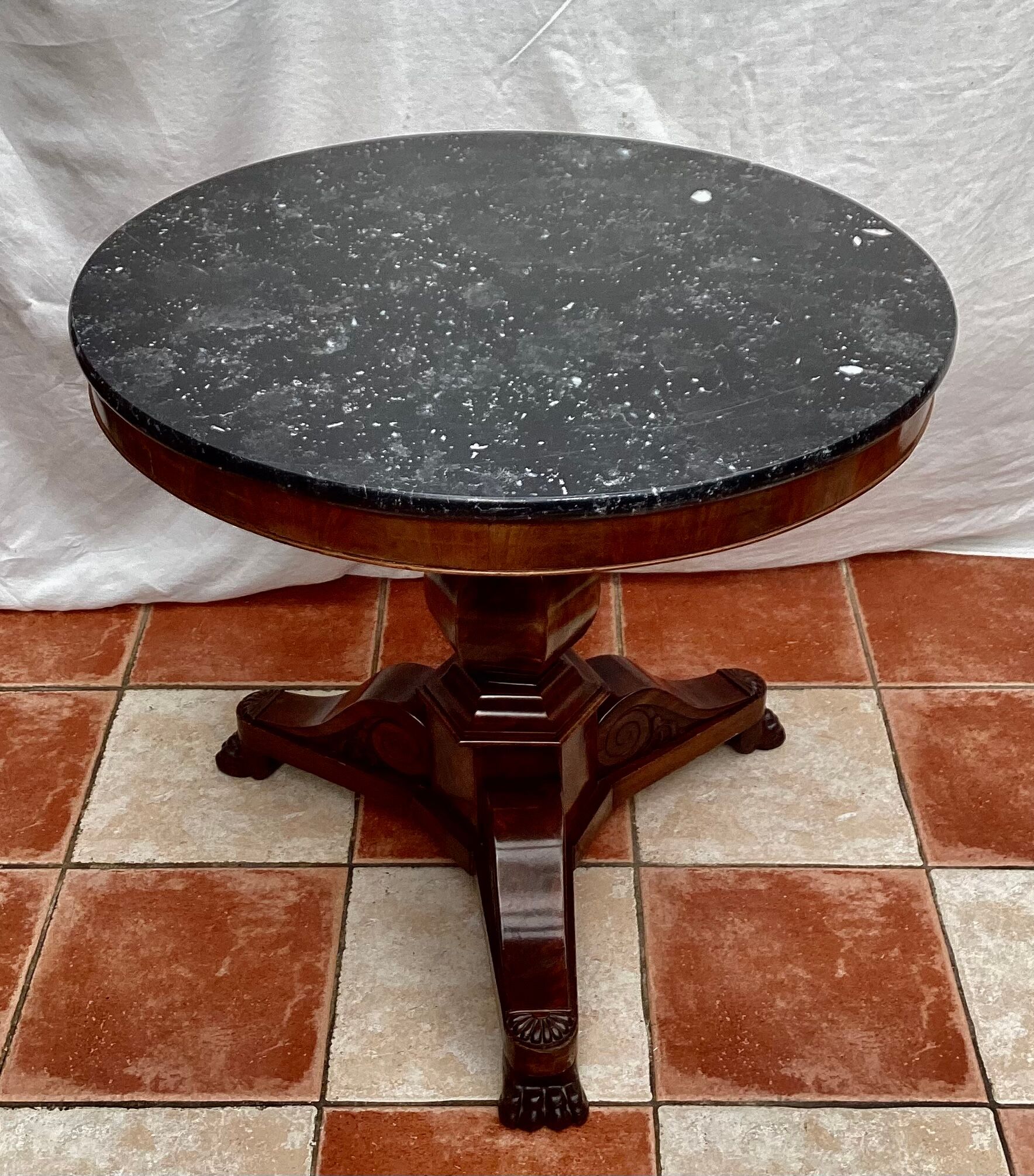 Old pedestal table in oak wood with marble