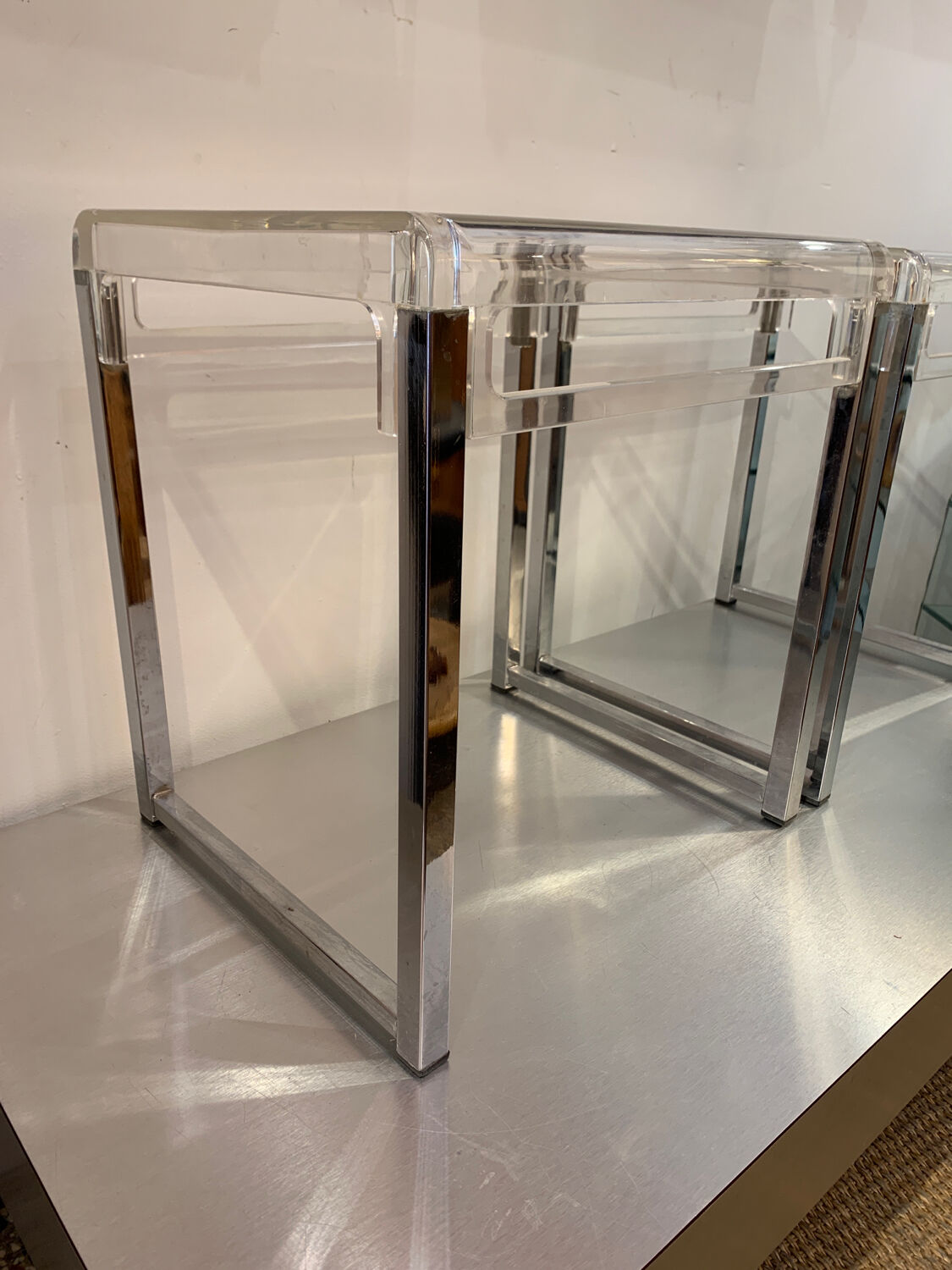 Pair of vintage chrome and acrylic glass bedside tables