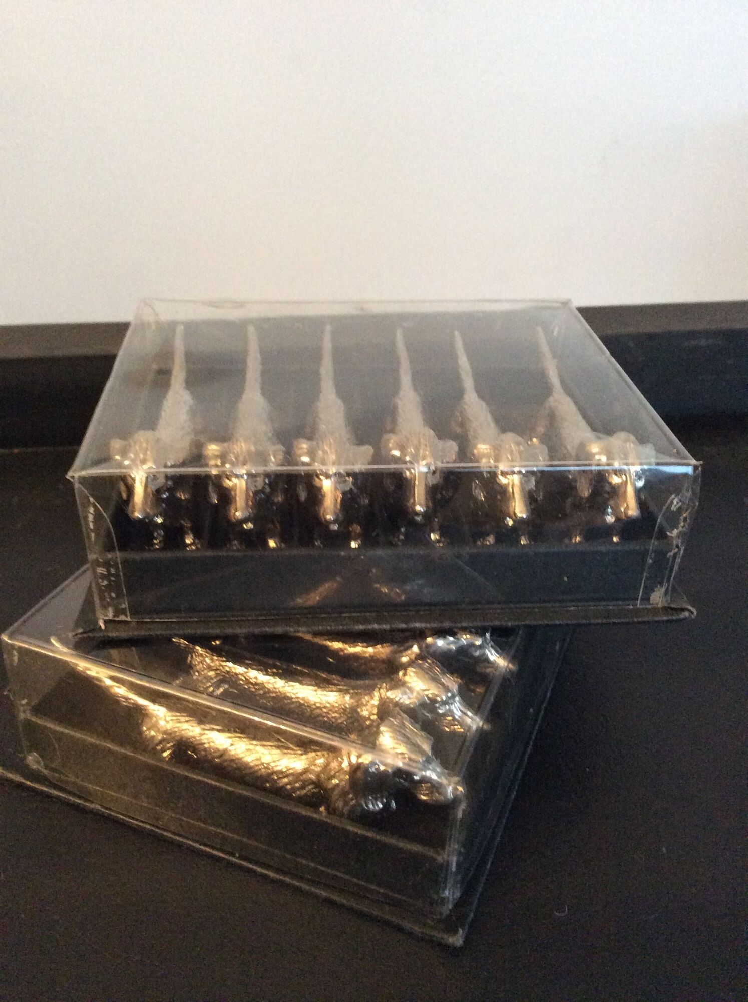 Series of 12 vintage dachshund knife holders in silver metal
