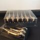 Series of 12 vintage dachshund knife holders in silver metal