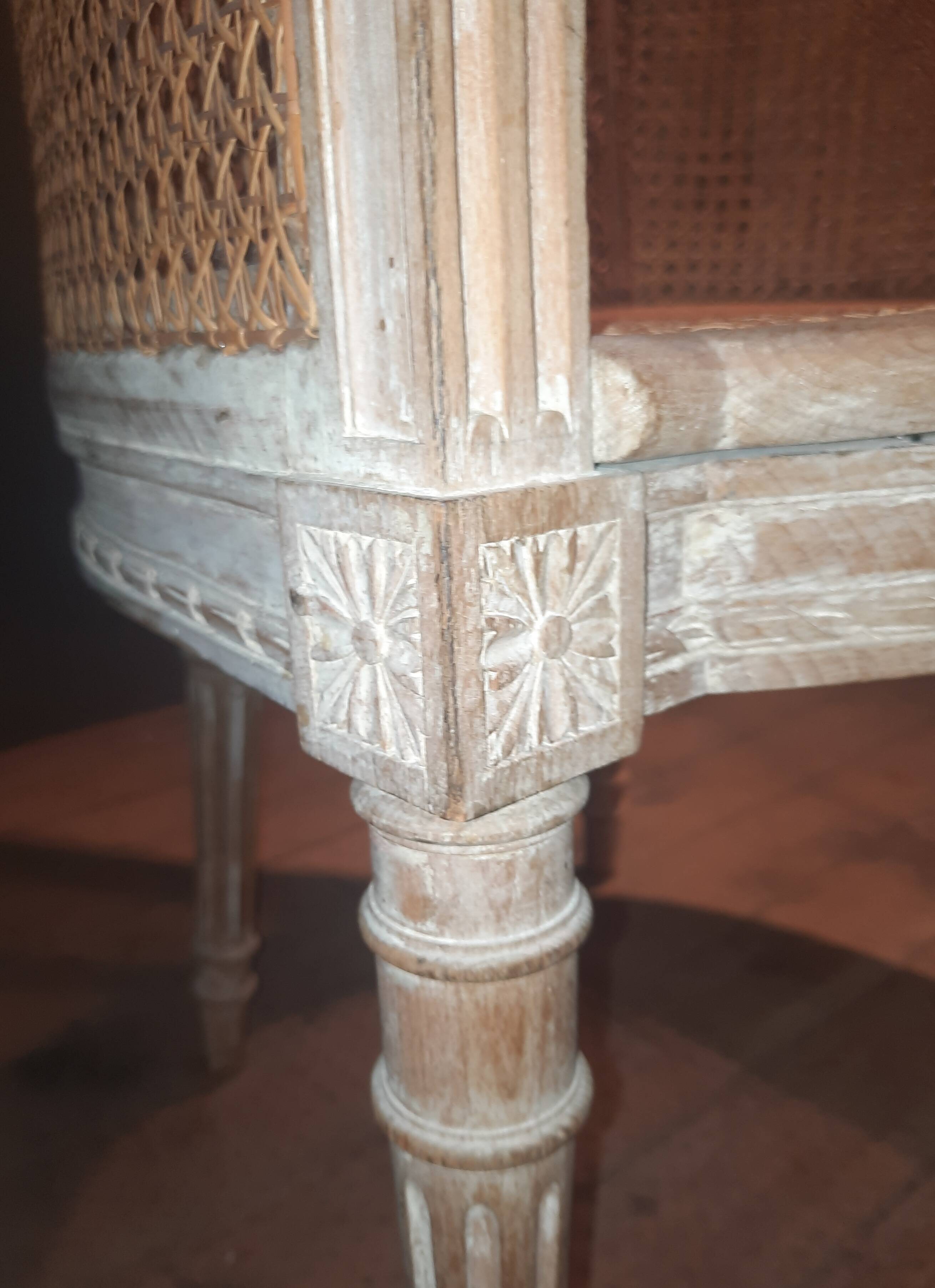 Louis XVI high-backed caned armchair
