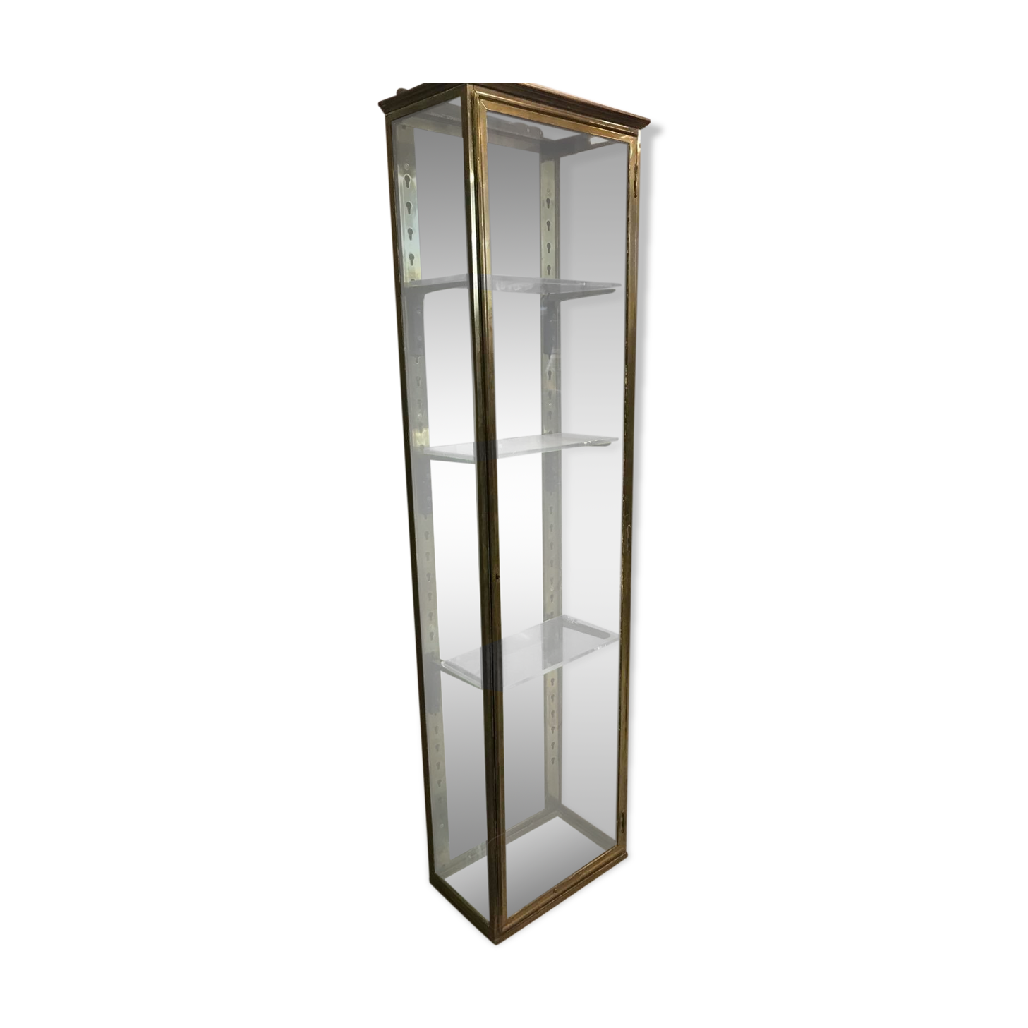 Old brass and mirror showcase