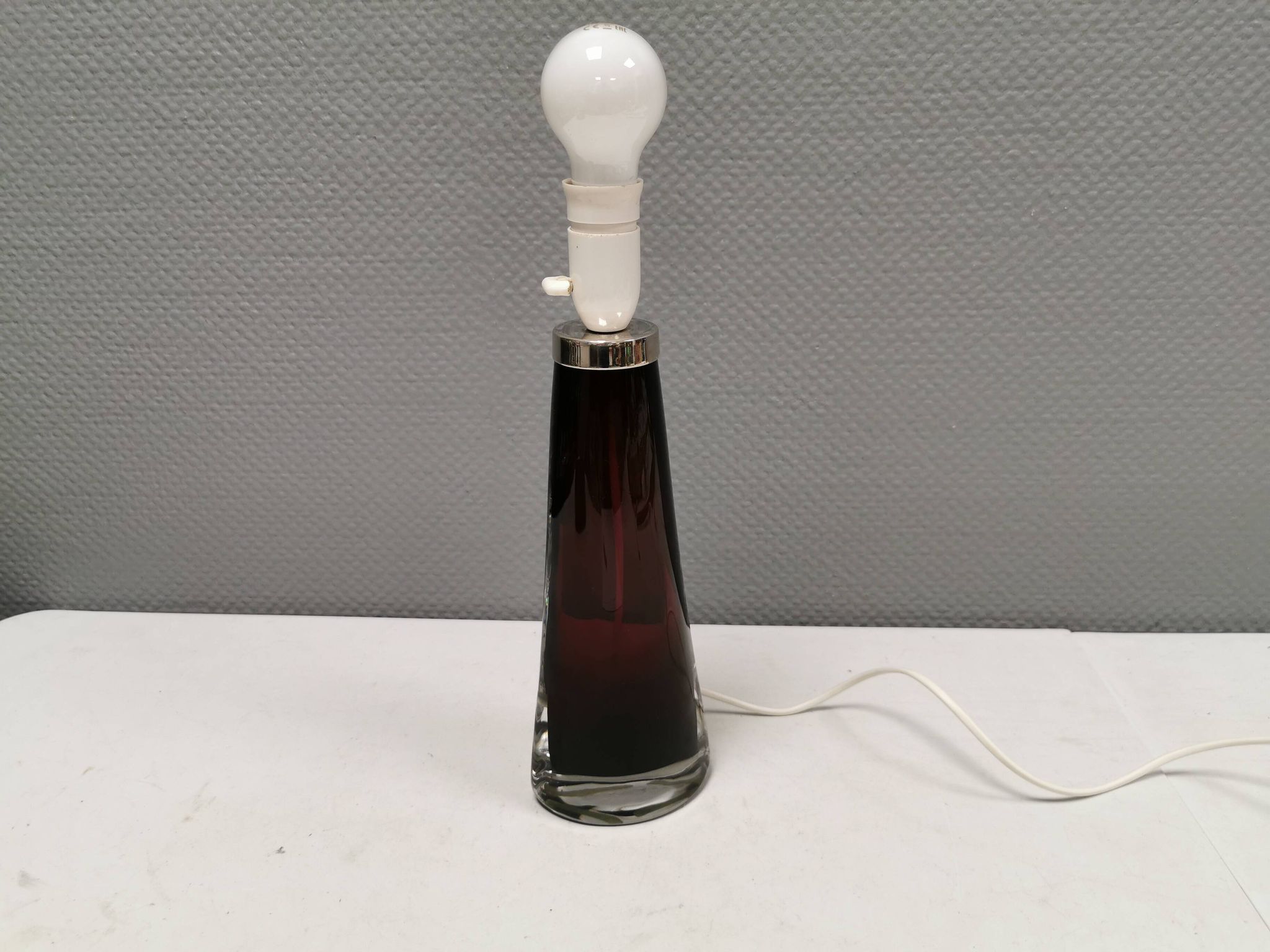 Table lamp by Carl Fagerlund for Orrefors Glassworks Sweden 1960s in translucent and deep red glass.