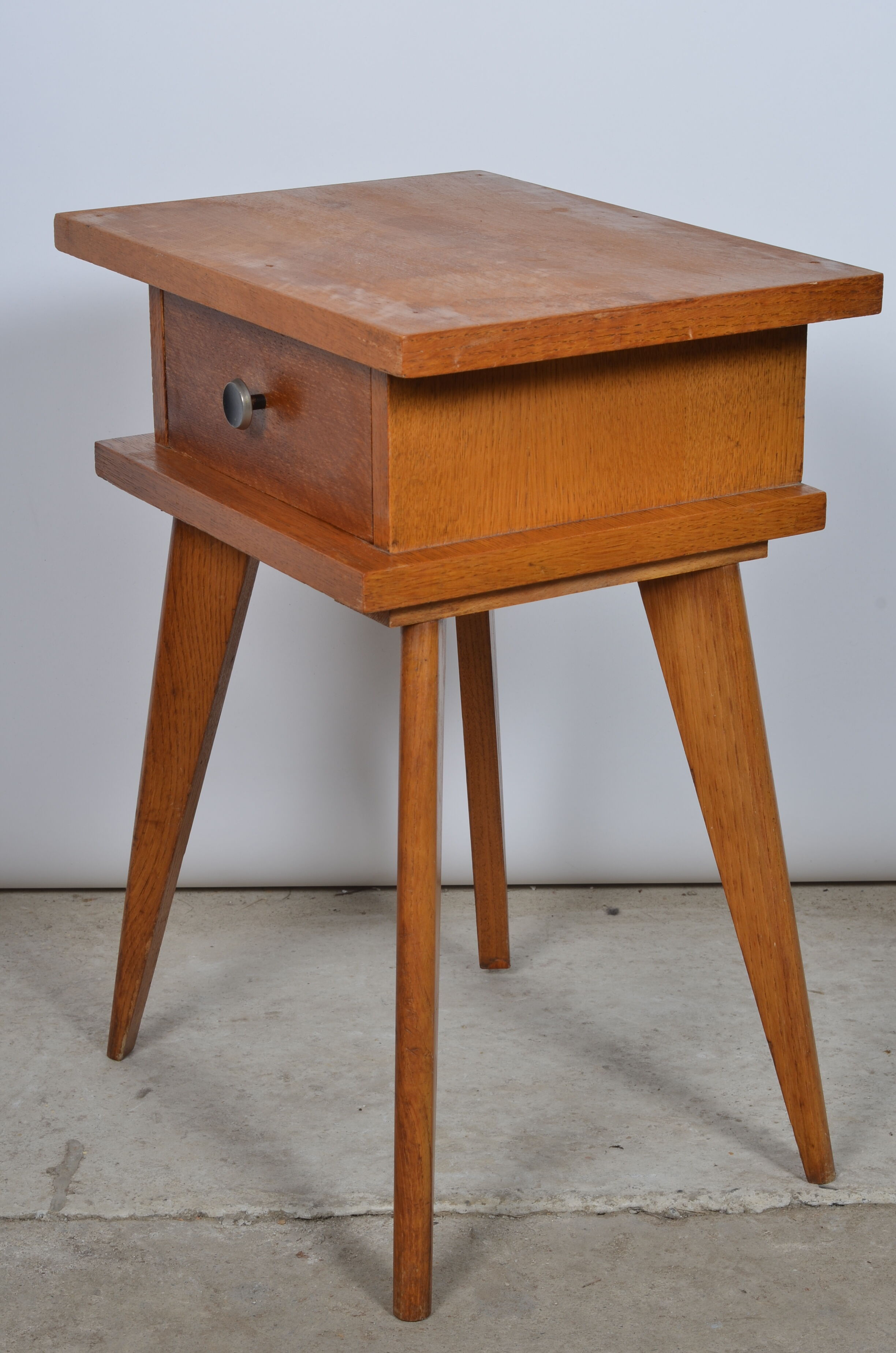 Compass feet bedside table