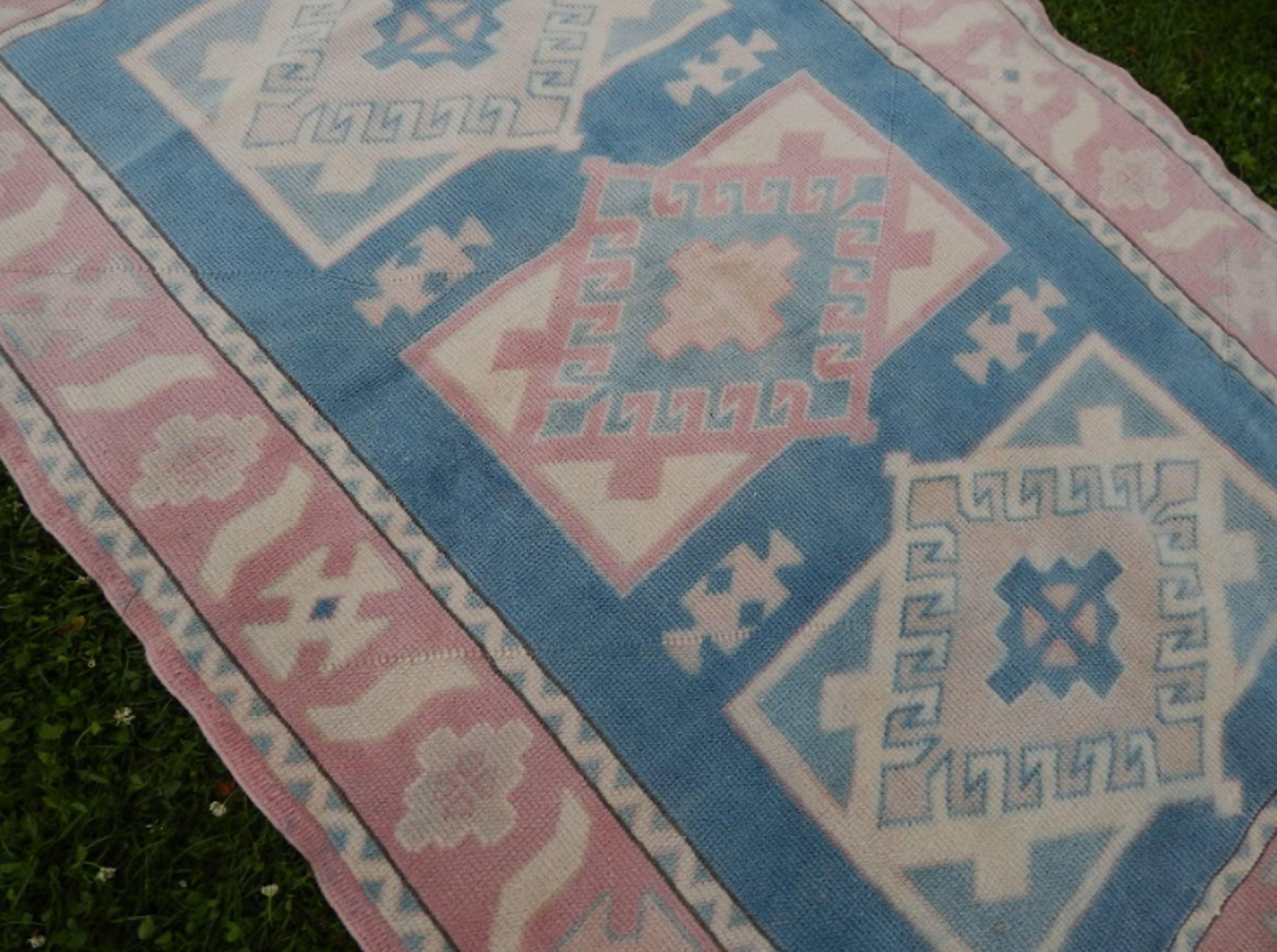 Turkish kars rug with rich border - 4′2″ × 6′2″ (128 x 188 cm)