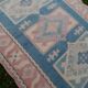 Turkish kars rug with rich border - 4′2″ × 6′2″ (128 x 188 cm)