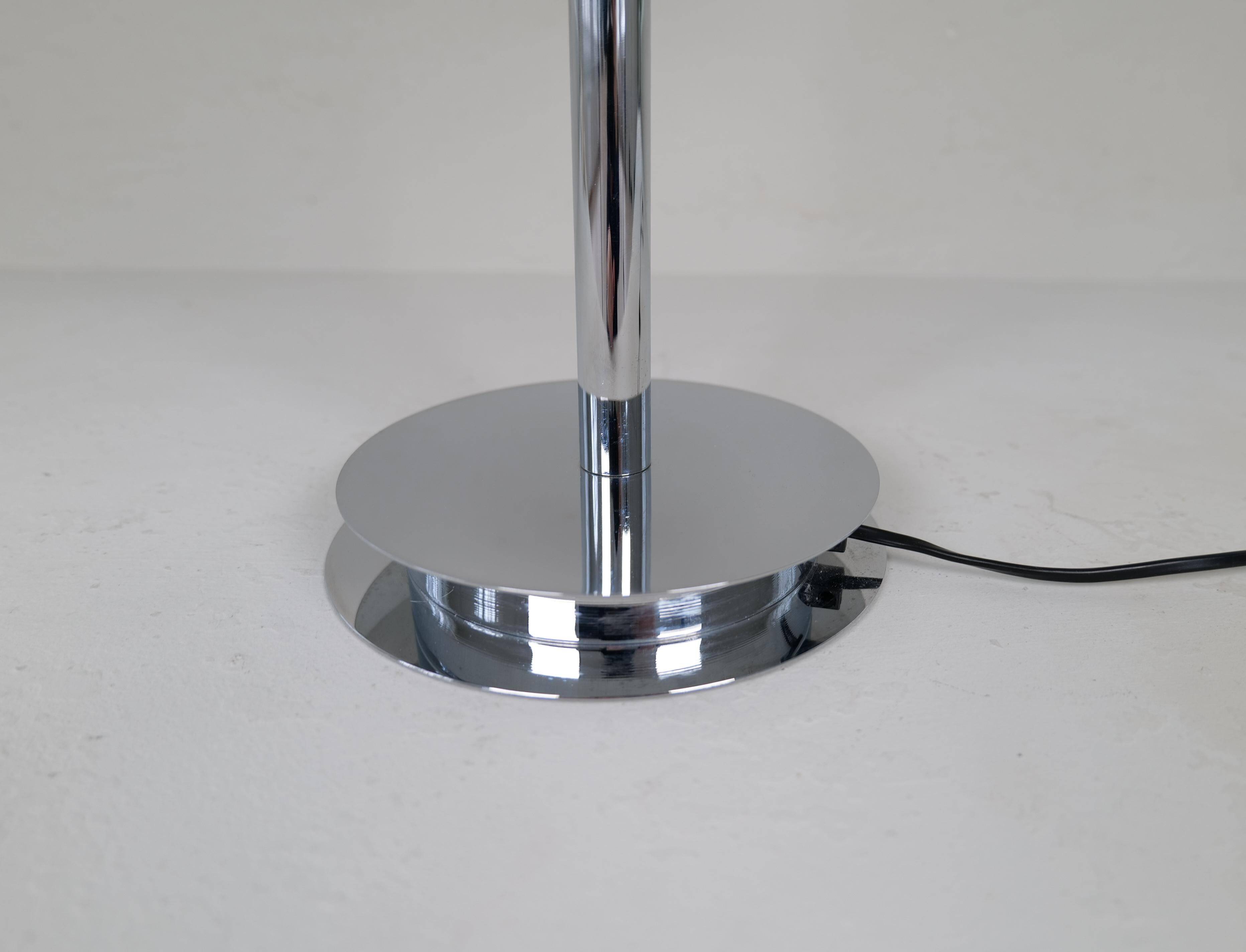 "Tris" glass table lamp by Fontana Arte from the Space Age with a chrome base, Italy, circa 2000.