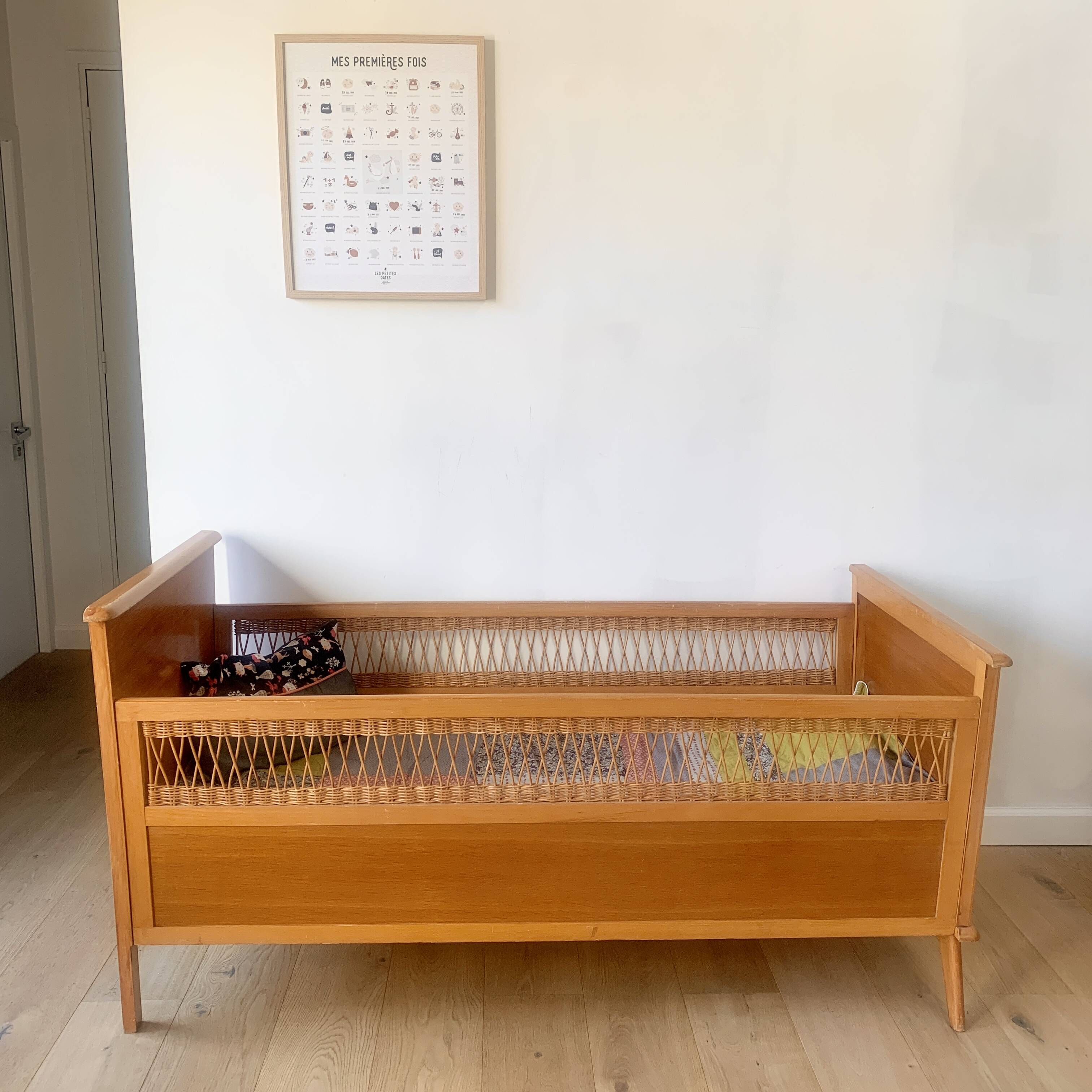 Wooden and wicker baby bed