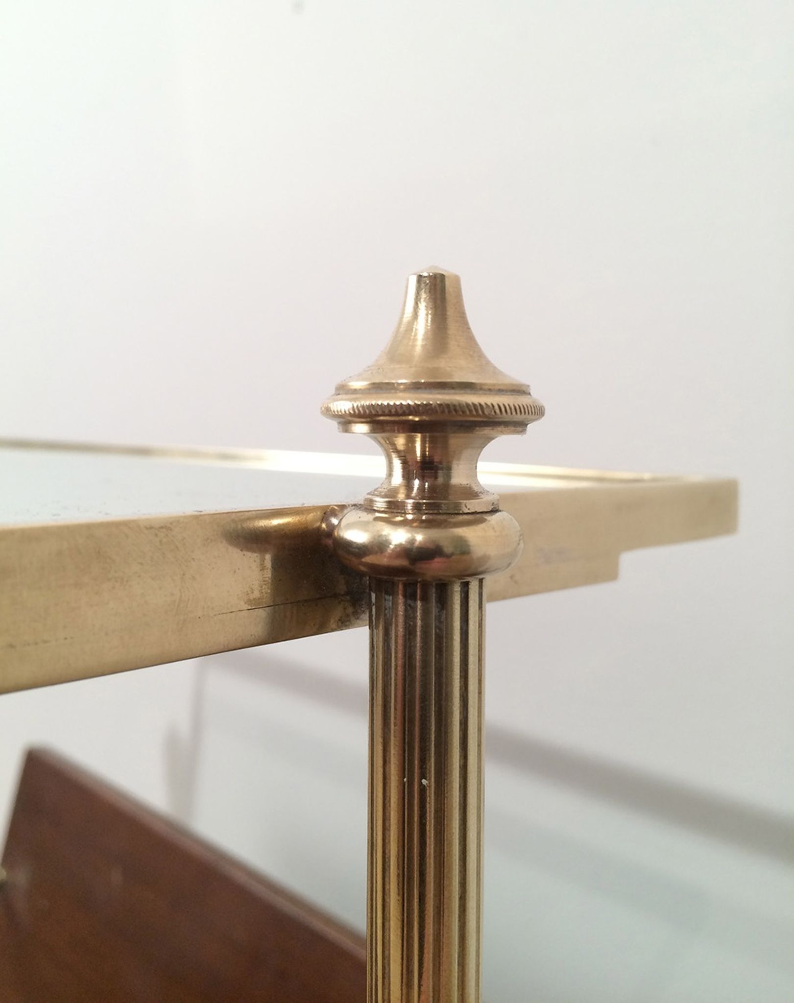 Neoclassical magazine rack in mahogany and brass