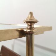 Neoclassical magazine rack in mahogany and brass
