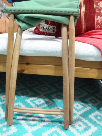 Folding wooden and canvas stool