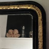 Miroir ancien noir et doré