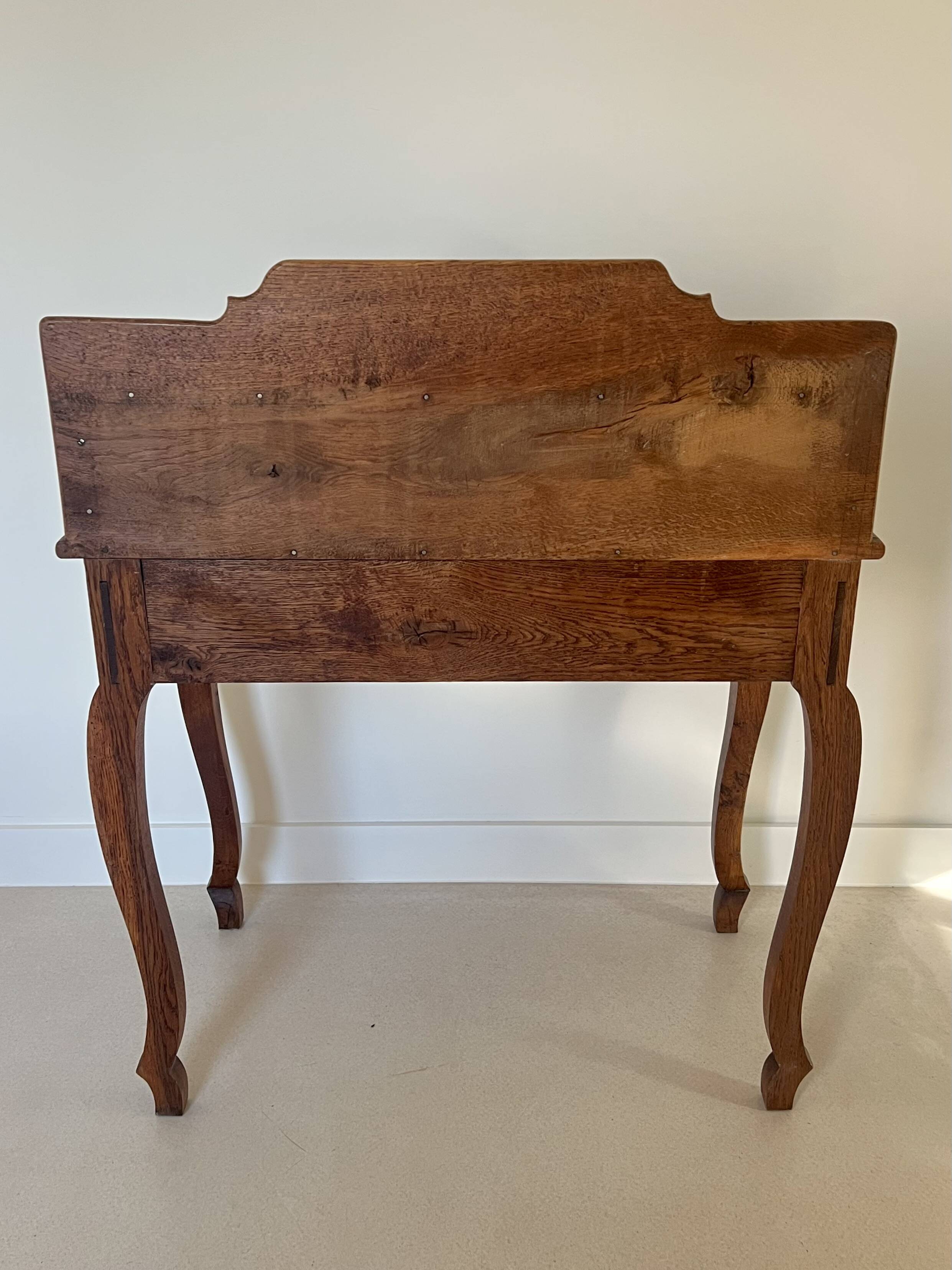 Oak desk in the Louis XV style.