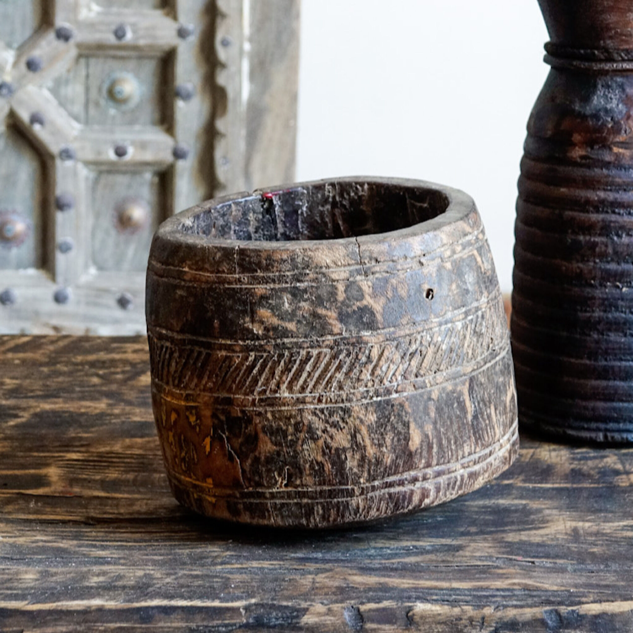 Old pot carved in wood