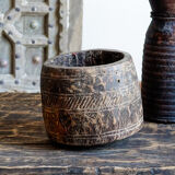 Old pot carved in wood