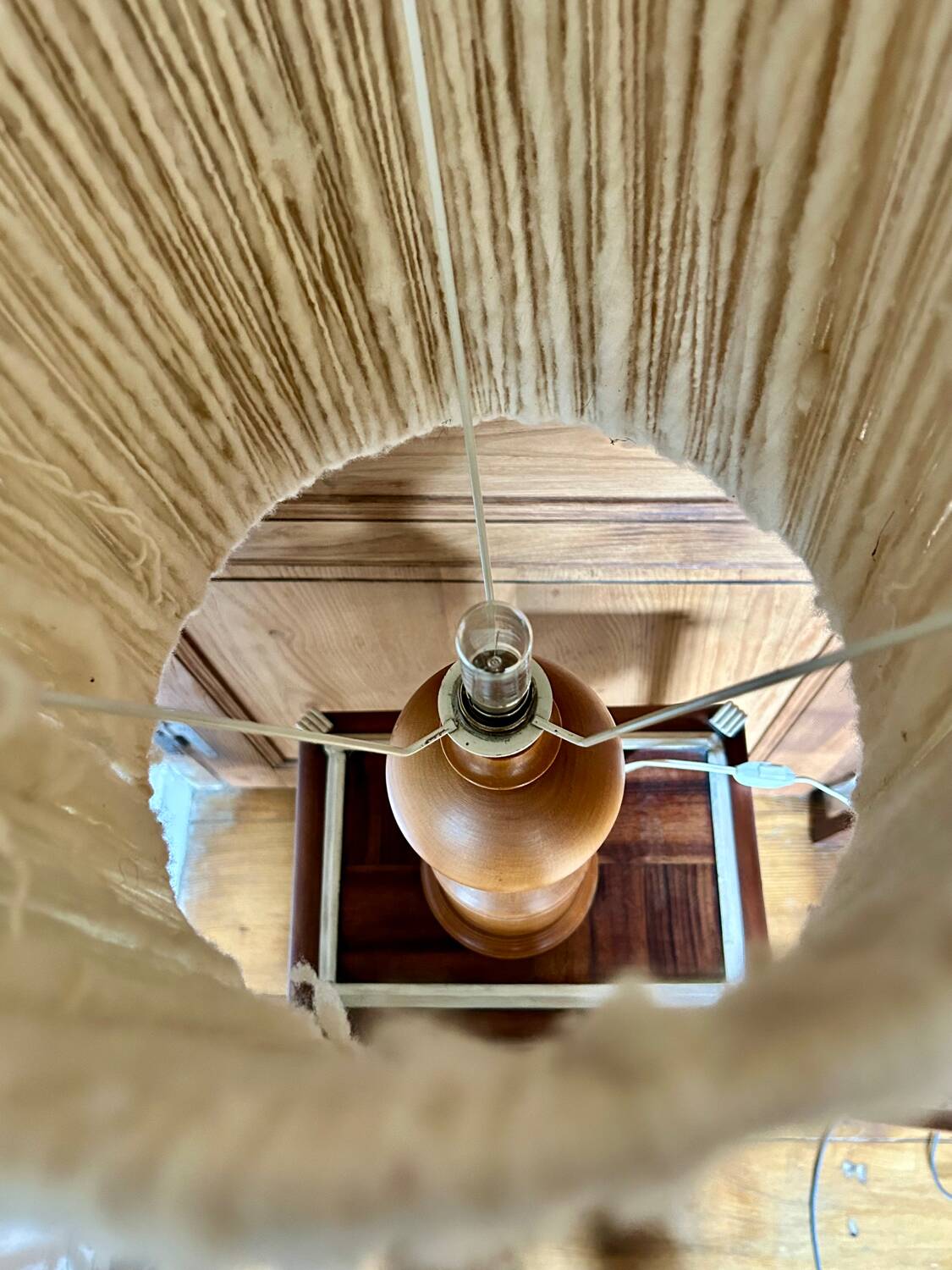 Turned wood base lamp with spun lampshade