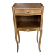 A bedside table with a drawer and a niche in Louis XV style.