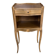 A bedside table with a drawer and a niche in Louis XV style.