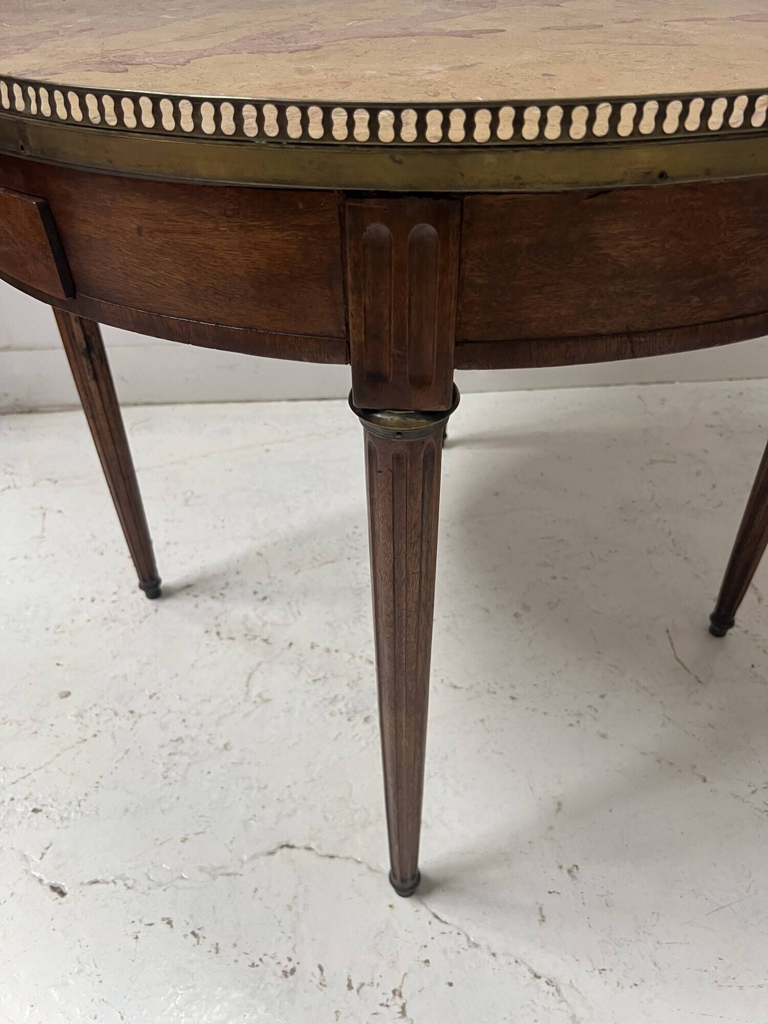 Louis XVI style bouillotte table in veneered wood, 20th century.