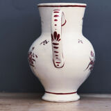 Old pitcher in earthenware, signed
