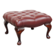 In very good condition elegant red/brown chesterfield ottoman made of cow leather