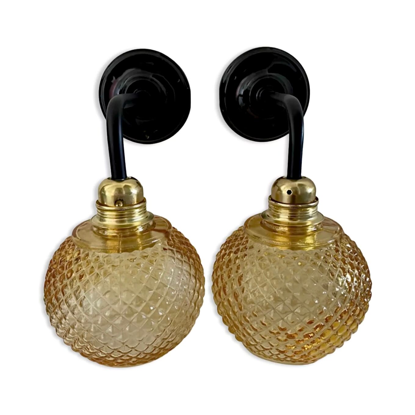 Pair of vintage sconces in electrified golden glass to nine