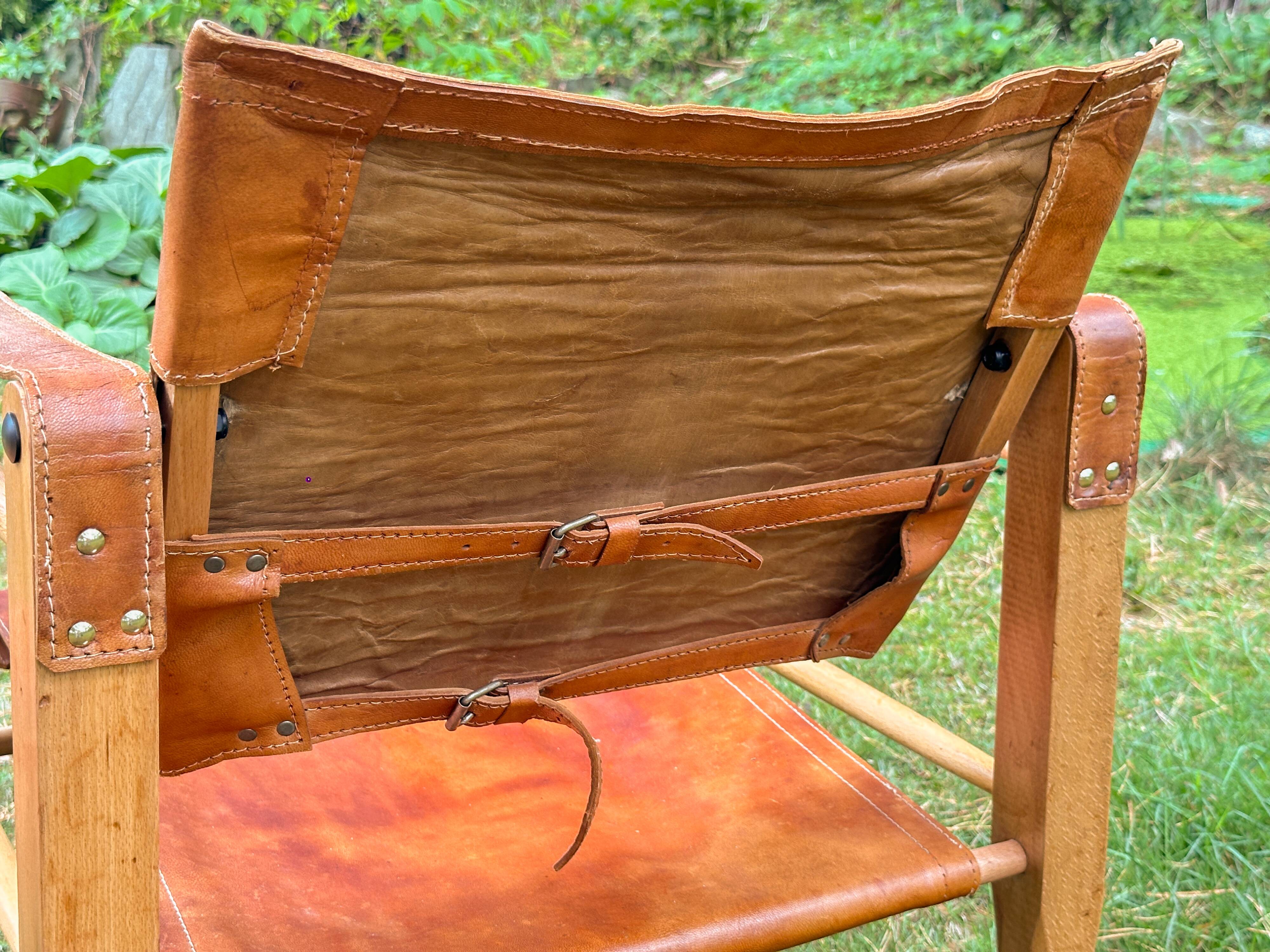 A pair of Danish beechwood and leather Safari armchairs - 1960