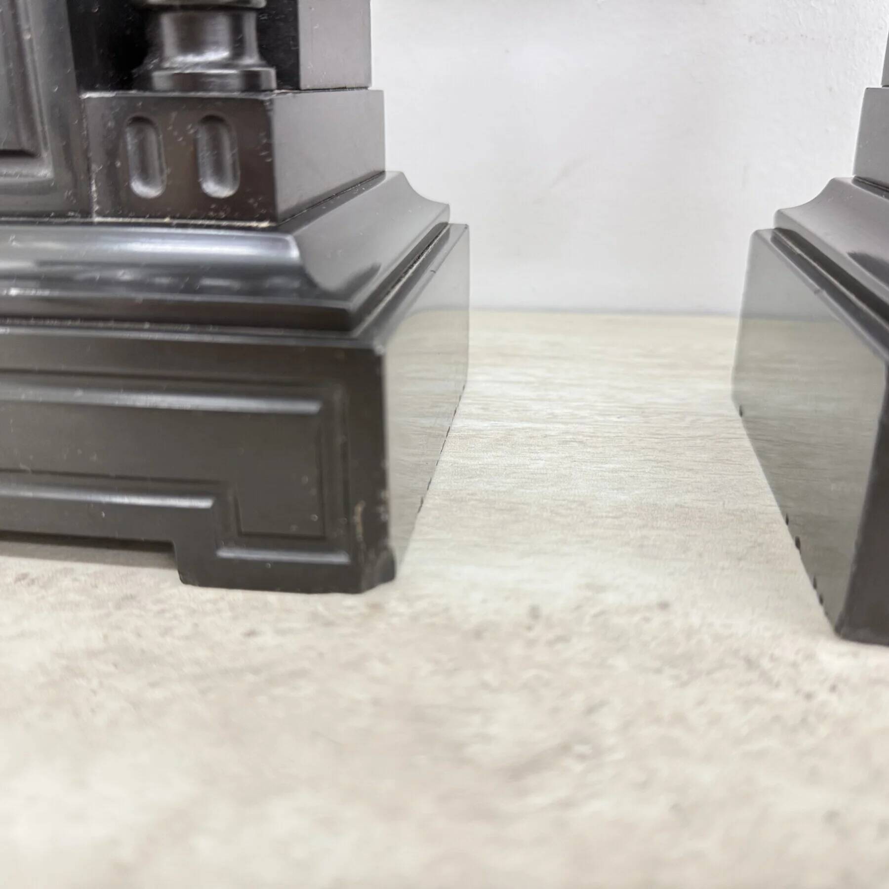 Antique French black marble cassoulets gilt decor pedestals neoclassical pair, 1900s