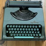 M.J. Rooy light green typewriter