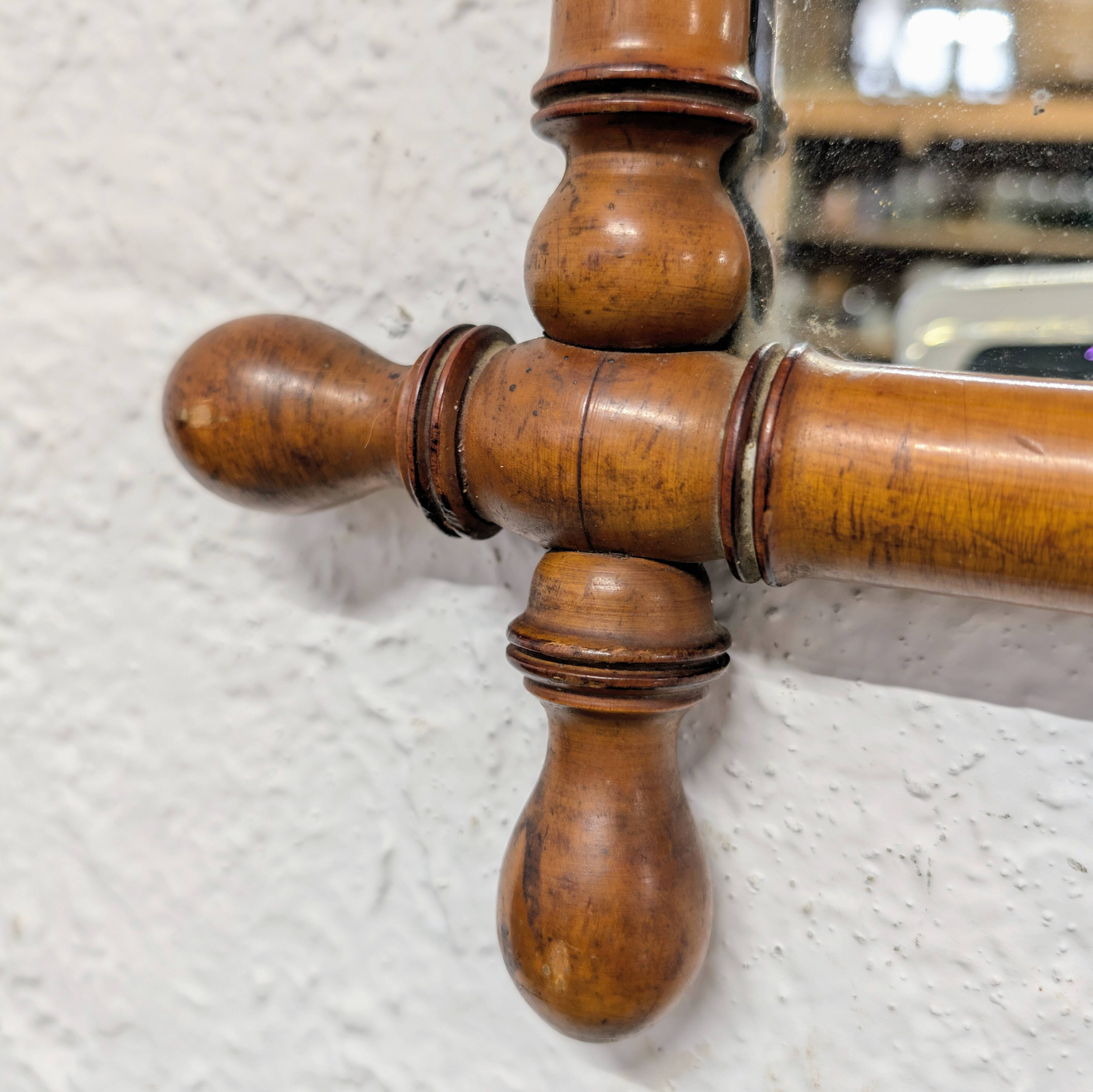 Antique turned wood mirror