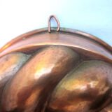 Old copper cake pan, braided crown, kitchen utensil