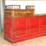 Former red patina and oak tray trading counter