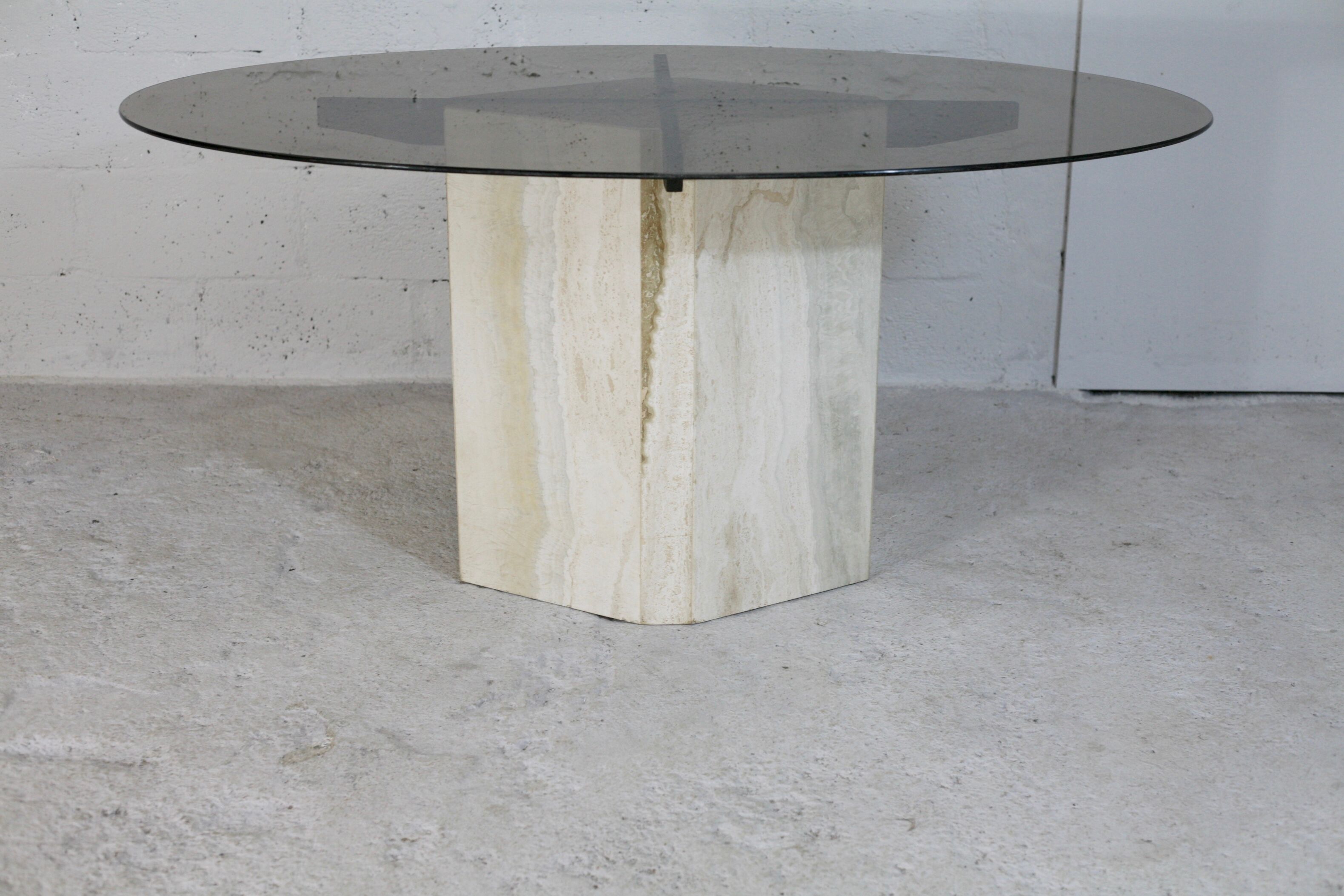 Living table, Comblanchian stone base and elliptical tray in smoked glass, Italy, 1970