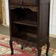 Oak accent furniture bookshelf with a drawer, early 20th century work.