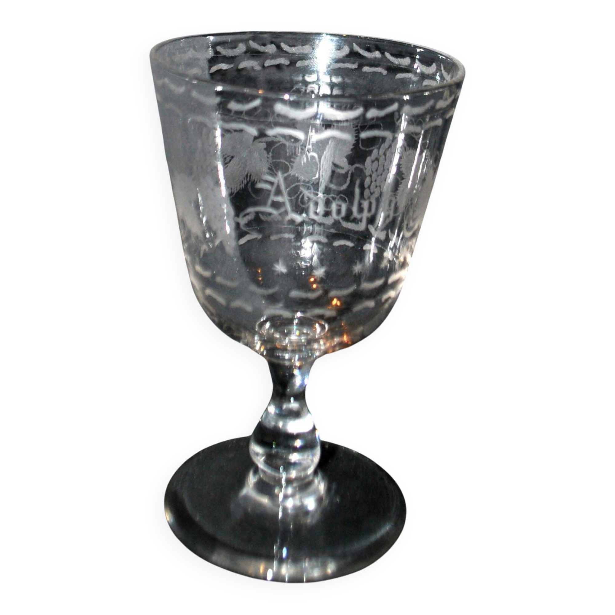 Antique souvenir glass tumbler engraved with the name Adolphe